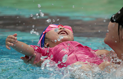 Baby playing in the water